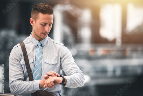 Businessman Looking on His Watches with Serious Face in Rush Hour - Business and Urban Lifestyle Concept