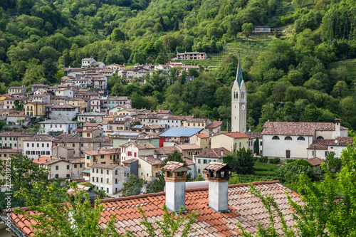 Valdobbiadene region of Prosecco sparkling wine, vineyards planted with steep slopes of hills.  Combai village, Italy