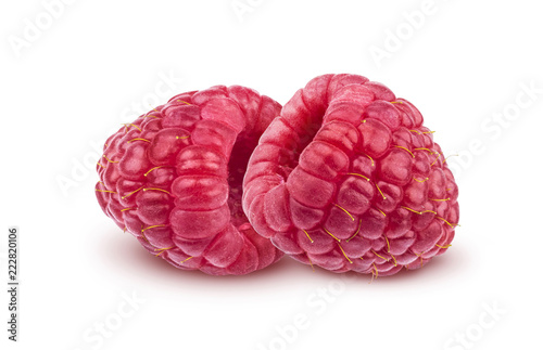 Two raspberries isolated on white background