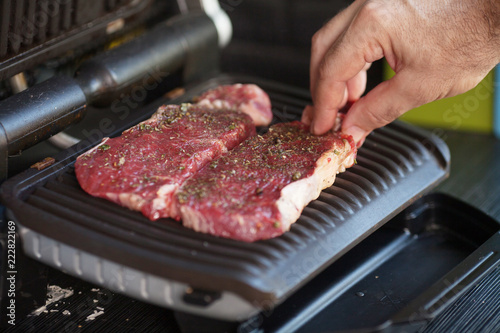 roast meat on electrical roaster close up