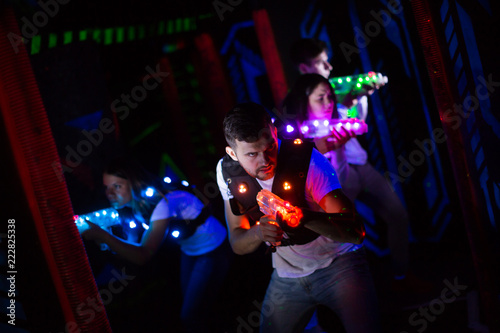Emotional guy playing laser tag