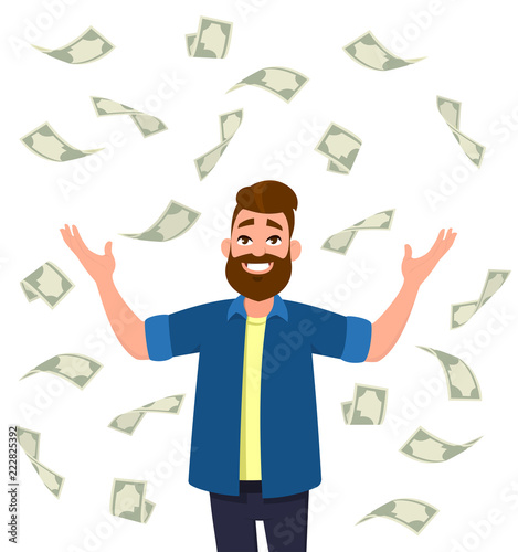 Cash/money/currency bills falling around young man.  Falling money  successful finance and business concept illustration in vector cartoon style.