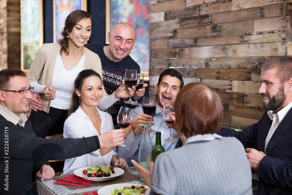 Company men and women in the restaurant