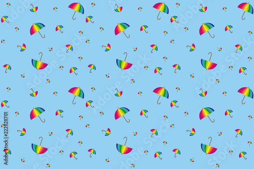 seamless background of rainbow colored umbrellas