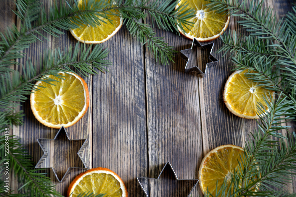 Christmas and new year background pine branches and dried oranges Christmas and new year background pine branches and dried oranges