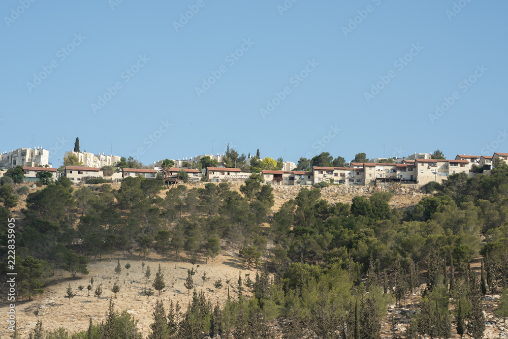 Jerusalem houses on the hill shot from below the road level