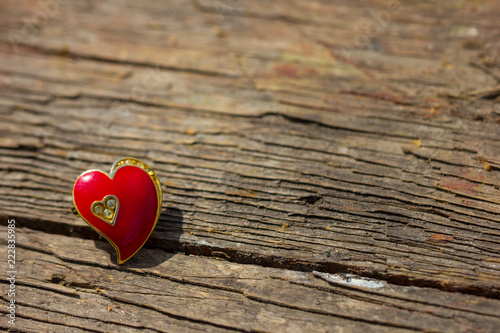 red heart on wooden background, concept of love