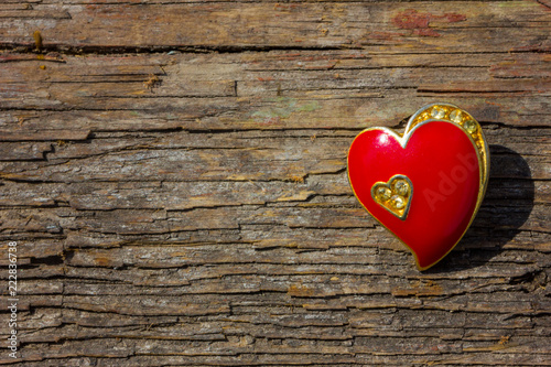 red heart on wooden background, concept of love
