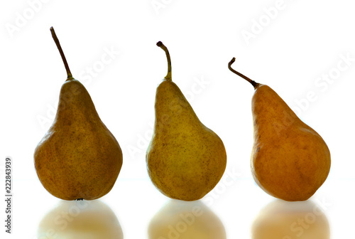 Juicy ripe pear on a white background