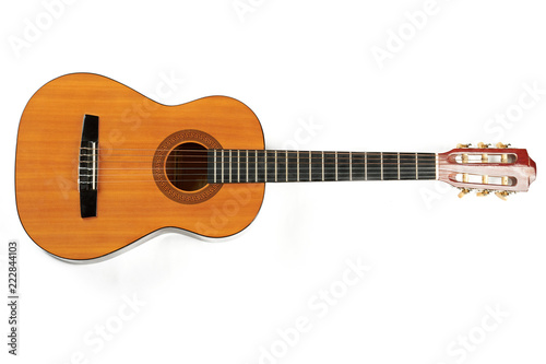 Guitar isolated on white background. Classical acoustic guitar, horizontal image. Traditional instrument of classical music.