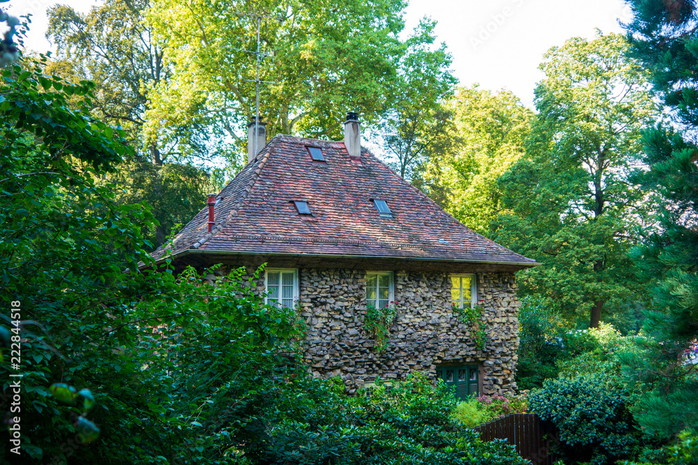Stone house in forest which reflect pure freedom and tradition Stone house in forest which reflect pure freedom and tradition