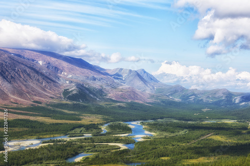 View of the Rai-Iz mountain and the Sob River in the Polar Urals on a sunny summer day, Yamal, Russia photo