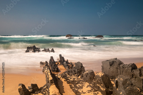 Waves at Praia do Castelejo - long eposure version photo