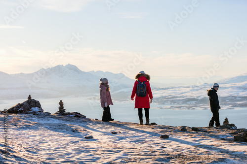 Mother and kids outdoors on winter