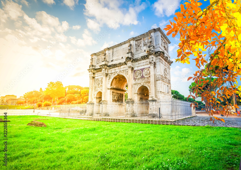 Fototapeta premium Arch of Constantine and Colosseum, antique Rome city, Italy at fall