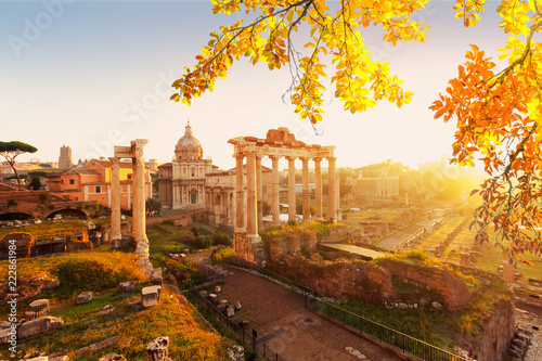 Forum - Roman ruins with cityscape of Rome with warm sunrire light, Italy af fall