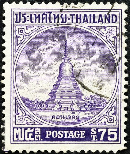 Ancient pagoda on vintage thai postage stamp