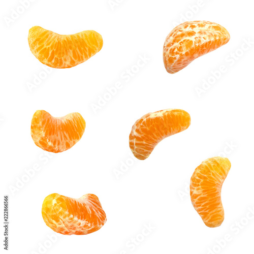 Fresh piece mandarins, tangerine, clementine isolated on white background. Minimalistic food concept.