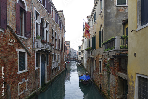 View of canal in Venice on the bridge. 
