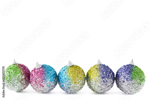 Christmas decor. Multicolored balls of sequins on white background.Isolated
