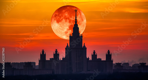 Moon collage of evening view of main building of Moscow State University photo