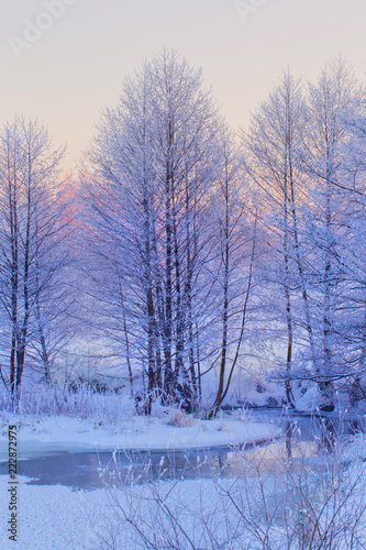 the winter river at sunset