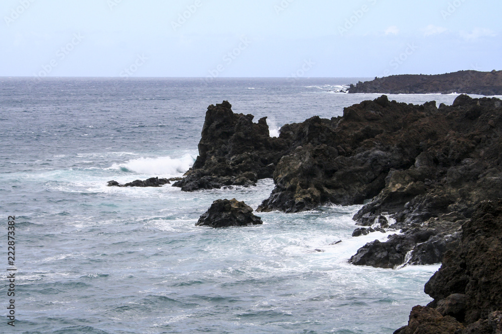 The infinity ocean licking the rocks on the coast of Lanzarote, Canary Islands