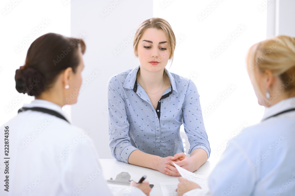 Doctor and patient at meeting. Medicine and health care concept Doctor and patient at meeting. Medicine and health care concept
