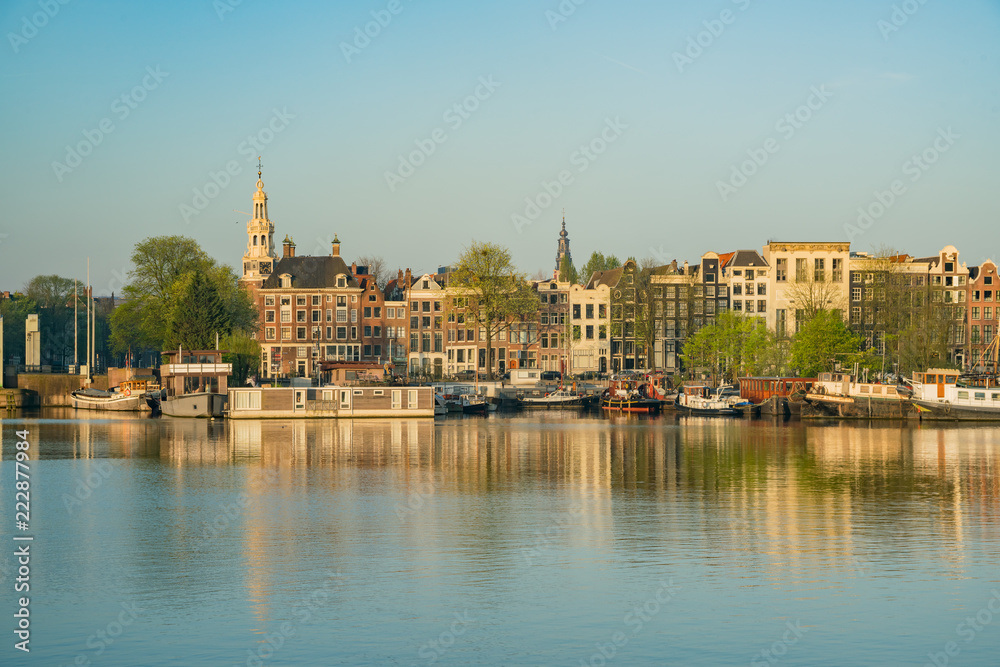 Morning view of the historical Montelbaanstoren Tower and cityscape