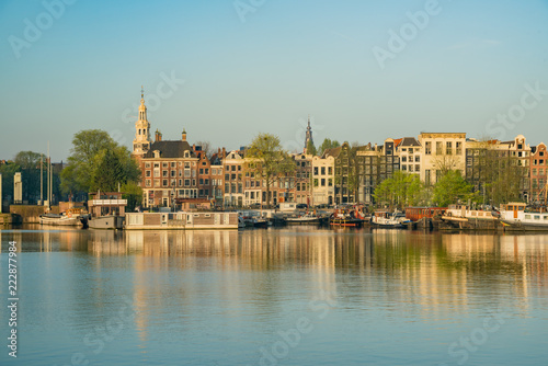 Morning view of the historical Montelbaanstoren Tower and cityscape