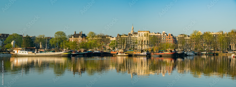 Panorama view of many dutch house with reflection