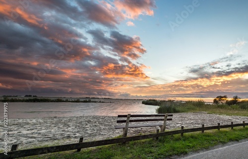 Lonely bank and sunset