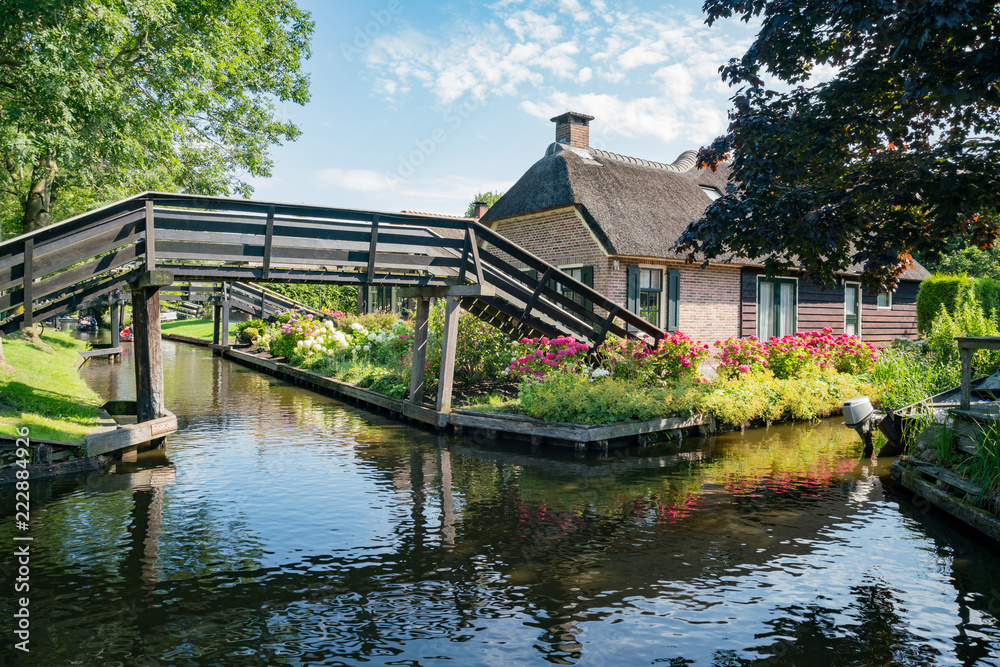Beautiful canal view and traditional house of Giethoorn Beautiful canal view and traditional house of Giethoorn