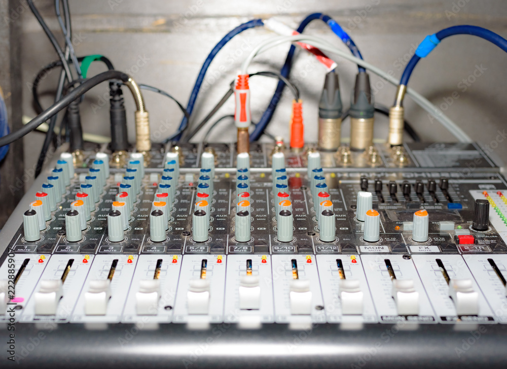 Close-up view the mixer panel of the sound producer with handles Close-up view the mixer panel of the sound producer with handles