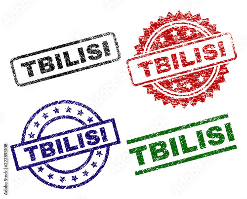 TBILISI seal prints with damaged texture. Black, green,red,blue vector rubber prints of TBILISI tag with corroded style. Rubber seals with circle, rectangle, rosette shapes.