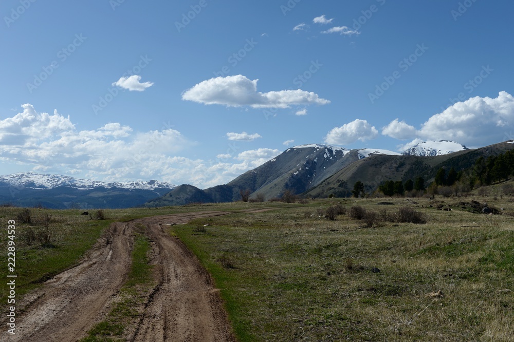 Mountain road in the area of the river Yarlyamry. Mountain Altai