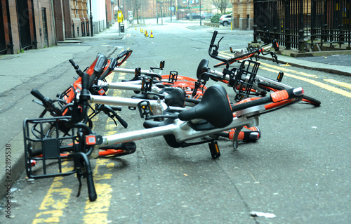 Editorial Photo of a collection of dumped Mobike cycle sharing bikes in a street photo