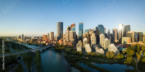 Aerial panoramic view of a beautiful modern cityscape during a vibrant sunny sunrise. Taken in Calgary Downtown  Alberta  Canada.