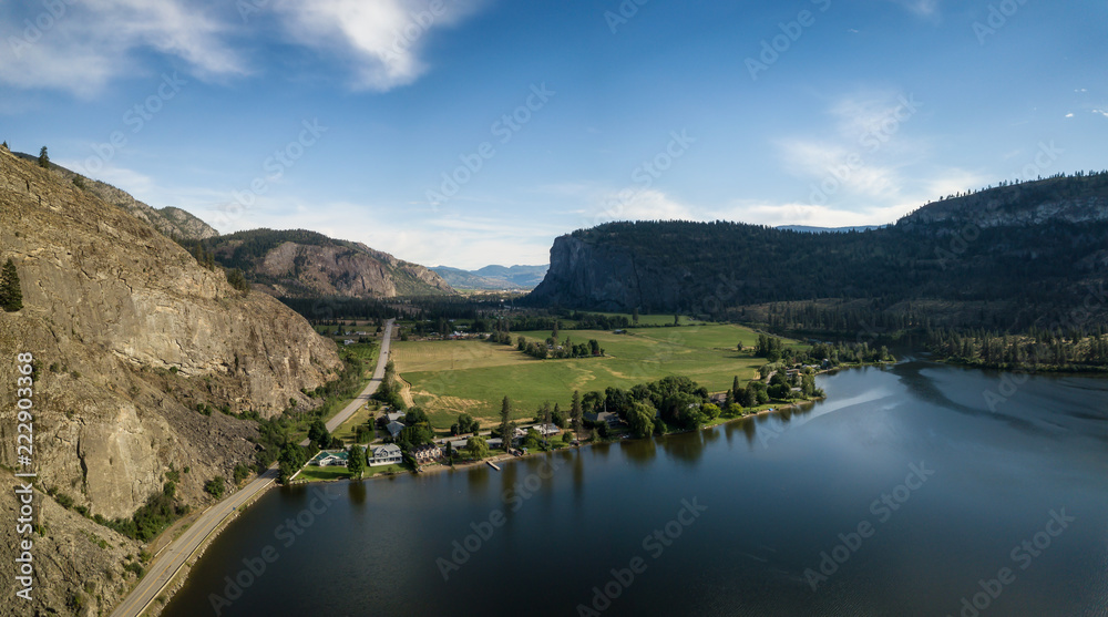Aerial panoramic view of Okanagan Hwy near Vaseux Lake during a sunny summer day. Located between Oliver and Penticton, BC, Canada.