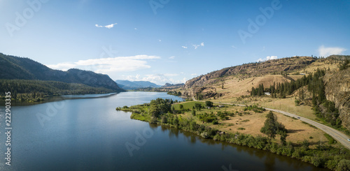 Aerial panoramic view of Okanagan Hwy near Vaseux Lake during a sunny summer day. Located between Oliver and Penticton, BC, Canada. photo