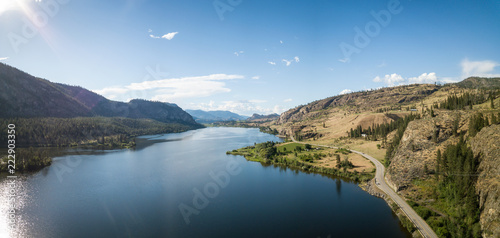 Aerial panoramic view of Okanagan Hwy near Vaseux Lake during a sunny summer day. Located between Oliver and Penticton, BC, Canada. photo