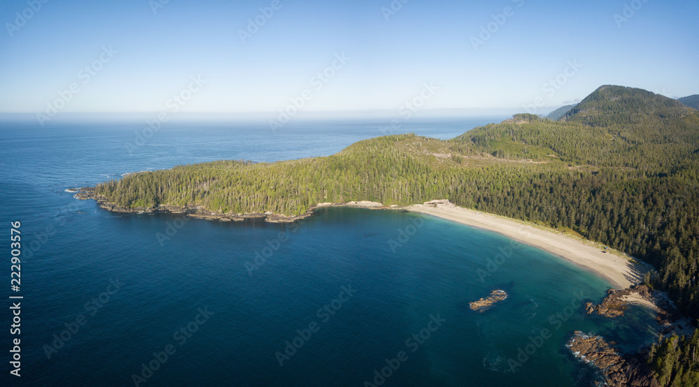 Beautiful aerial panoramic seascape view of Pacific Ocean Coast during a vibrant summer day. Taken at Grant Bay, Northern Vancouver Island, BC, Canada. Beautiful aerial panoramic seascape view of Pacific Ocean Coast during a vibrant summer day. Taken at Grant Bay, Northern Vancouver Island, BC, Canada.