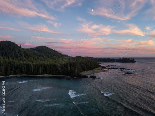 Aerial view of a beautiful beach on Pacific Ocean Coast druing a vibrant sunny summer sunset. Taken in Raft Cove Provincial Park  Nortern Vancouver Island  BC  Canada.