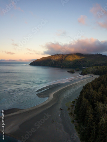 Striking aerial view of the Pacific Ocean Coast during a vibrant summer sunrise. Taken in San Josef Bay, Cape Scott, Northern Vancouver Island, BC, Canada.