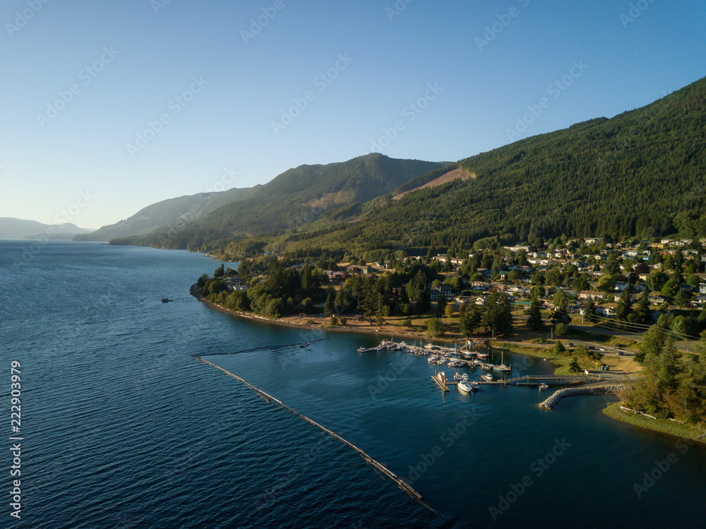 Aerial view of a small town, Port Alice, during a sunny summer sunset. Located in Northern Vancouver Island, BC, Canada.