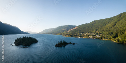 Aerial panoramic view of a small town, Port Alice, during a sunny summer sunset. Located in Northern Vancouver Island, BC, Canada.