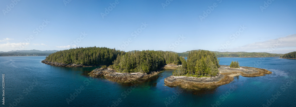 Aerial panoramic landscape of a rocky coast during a vibrant summer day. Taken on the Northern Vancouver Island, British Columbia, Canada.
