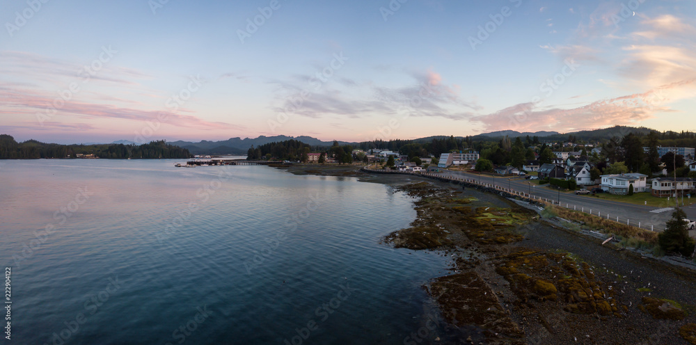 Aerial panoramic view of a small town, Port Hardy, during a cloudy summer sunset. Located in Northern Vancouver Island, BC, Canada.