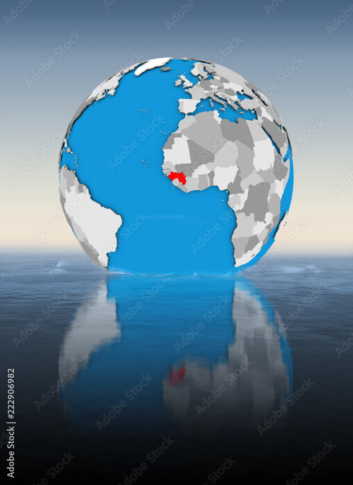 Guinea on globe in water Guinea on globe in water