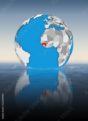Guinea on globe in water
